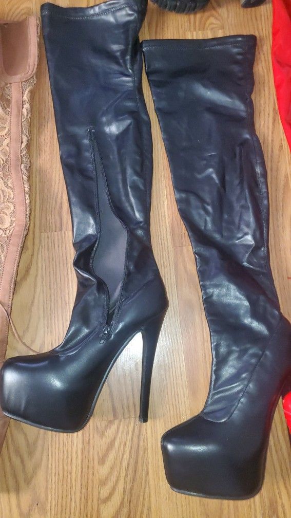 Multiple Pairs Of Thigh High Boots