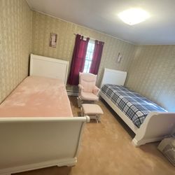 2 White Wooden Twin beds W Brand New Mattress & Box Spring And Rocking Chair