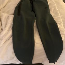 green nike tech fleece joggers