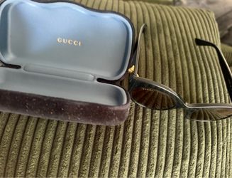 Authentic sunglasses used and scratched