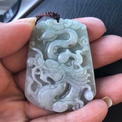 Certified A jadeite light green color carved Dragon pendant
