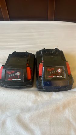 Pair of Milwaukee Batteries 2.0 and 3.0
