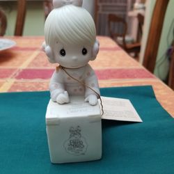 "Sharing Is Universal" Precious Moments Figurine