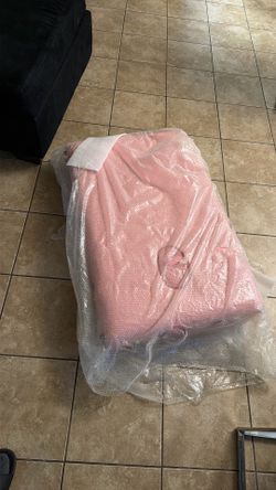 Pink massage table