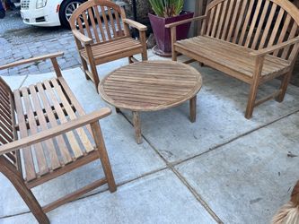Smith & Hawken Teak outdoor bench style seating and matching round coffee table All pieces are by smith and hawken Located in concord Recently cl