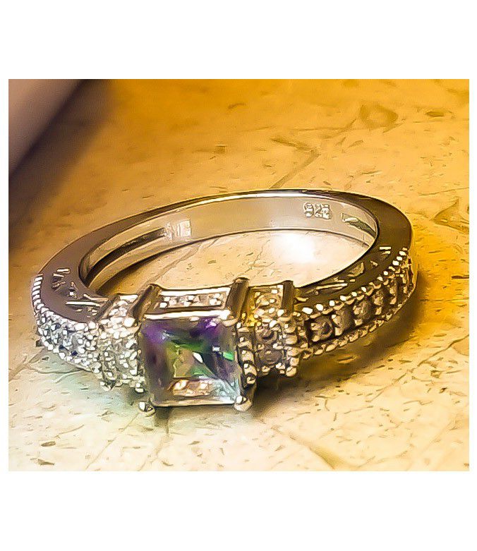 Stunning Real Silver w/ Rainbow Sapphire surrounded by crystals Ring Size 7 New Retails $57!. Shipped with USPS