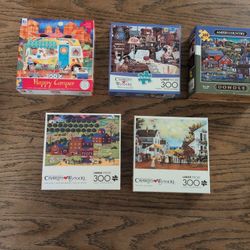 300-Piece Puzzles…$20 for all. 