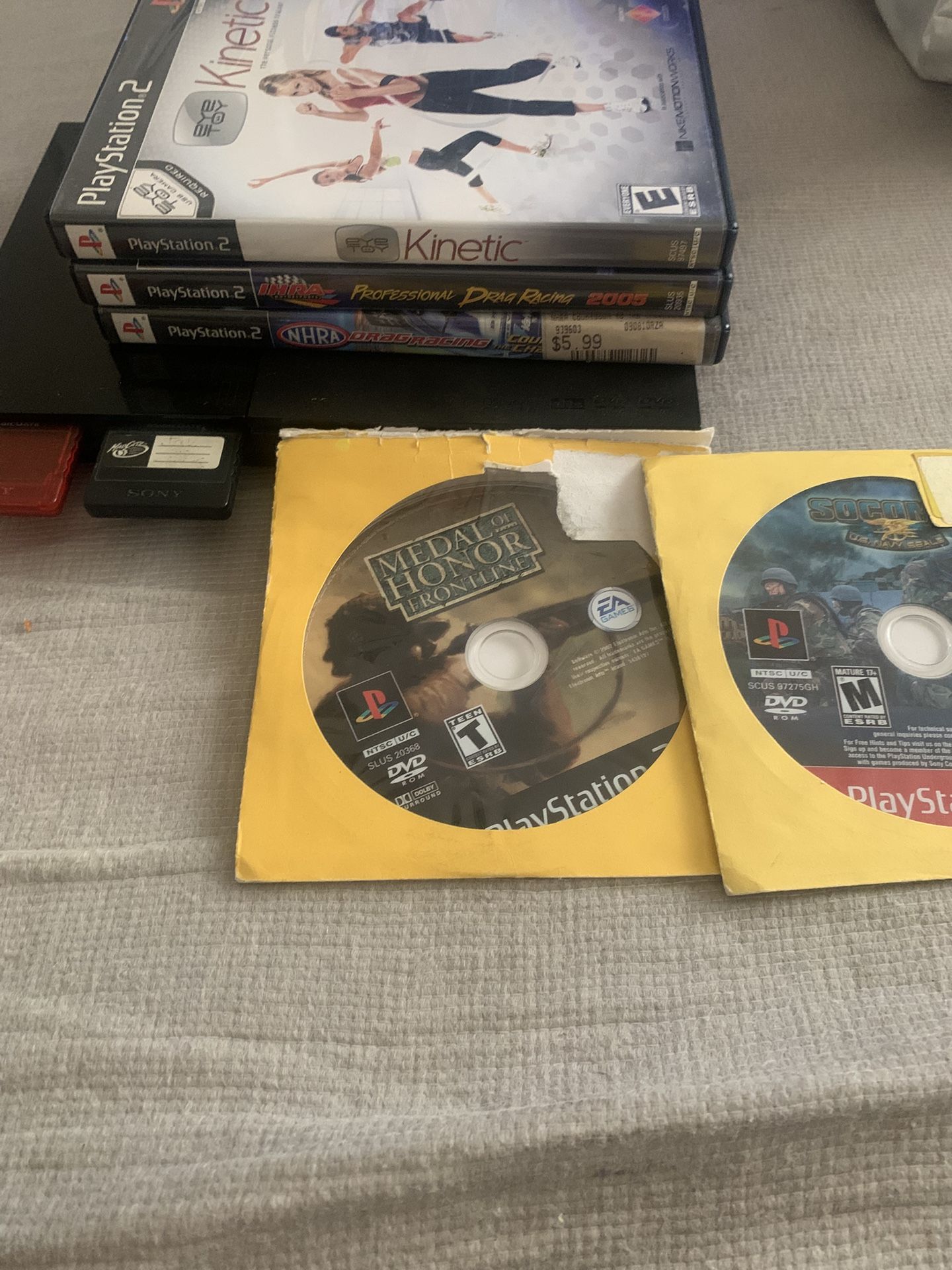 Playstation 2 With Games, And Memory Cards. No Cords