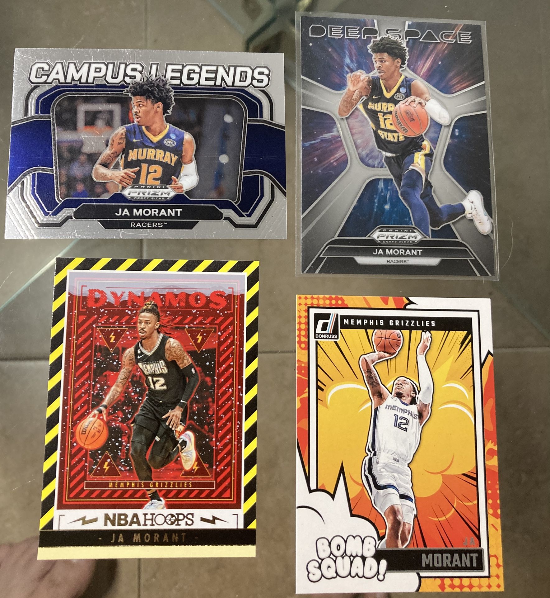 4 card NBA basketball Grizzlies Ja Morant Prizm Rc Hoops etc All cards are In good condition near mint to mint - gem. .