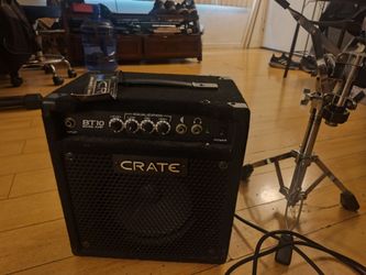 Crate bass practice amp and a drum  stand