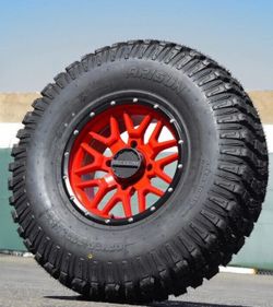 SUPER-SALE. On Raceline 15x7 4x137 wheels & 30x10-15 Tires for Can Am Honda UTV SXS (We Finance..