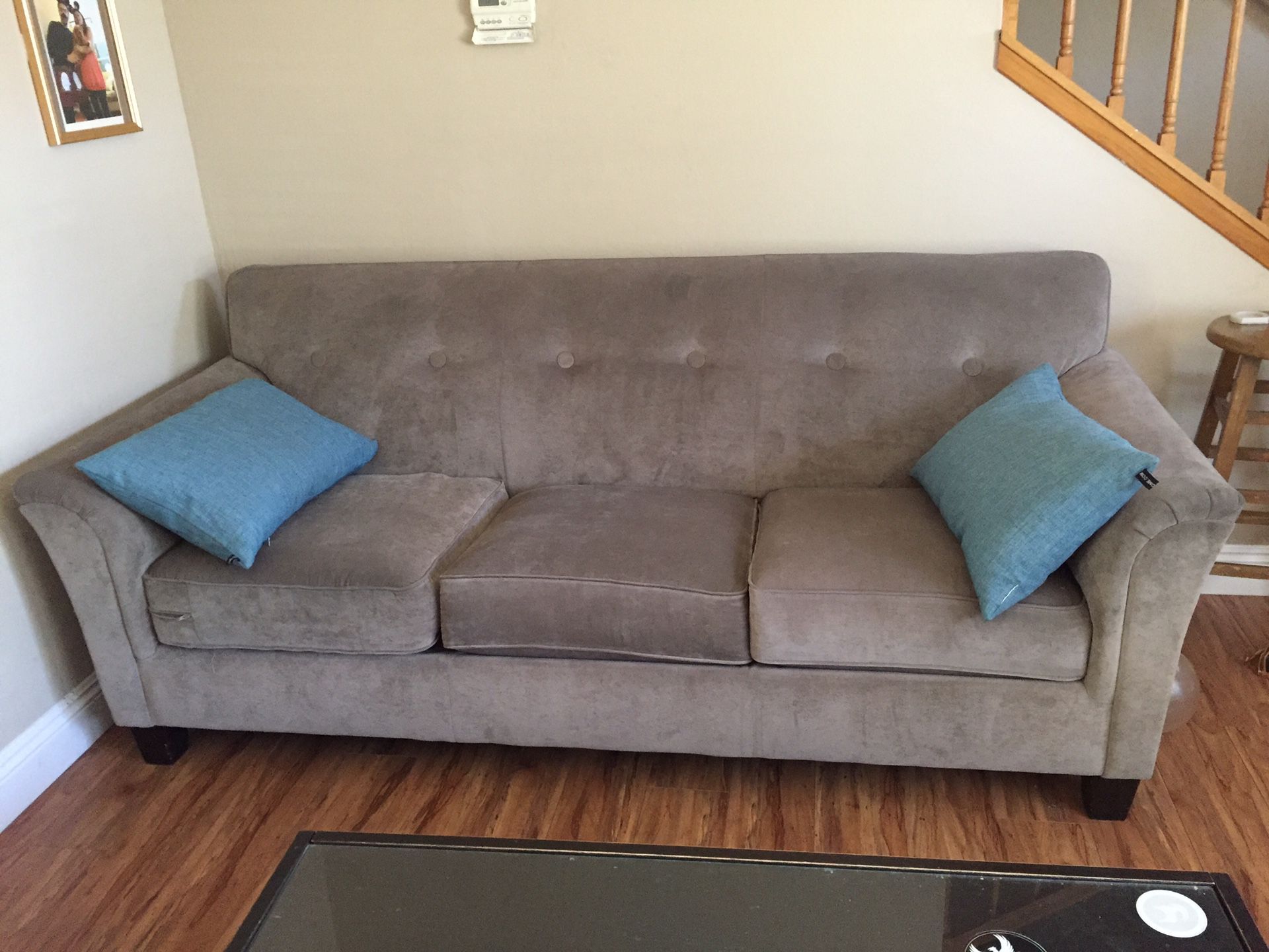 Grey couch and love seat
