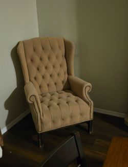 Vintage Tufted Wingback Chair. Gold Color.
