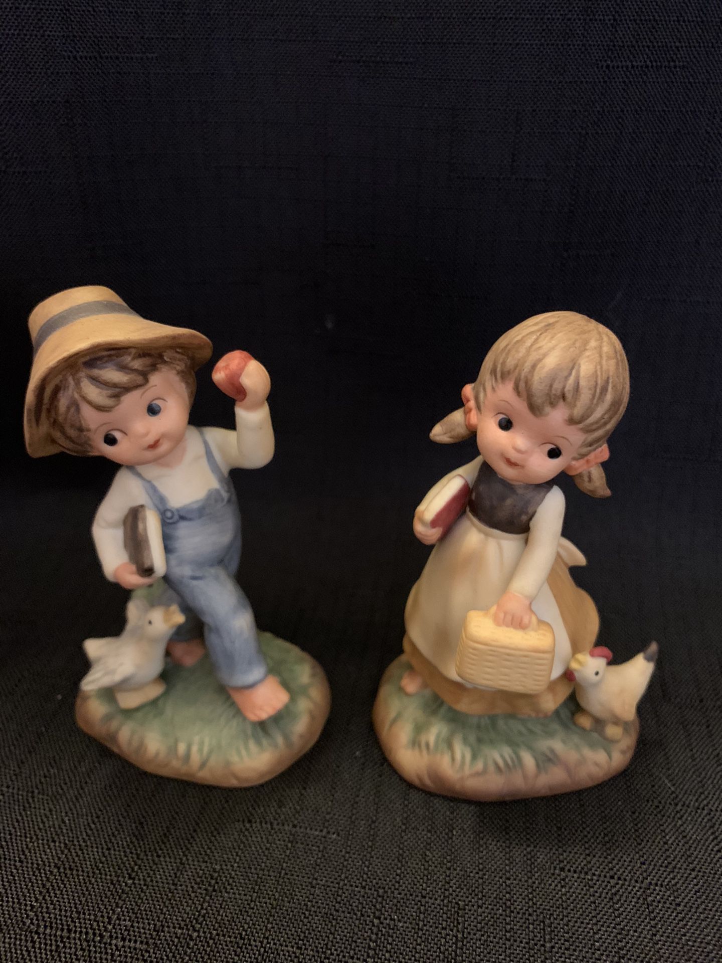 Napcoware Porcelain boy and girl figures