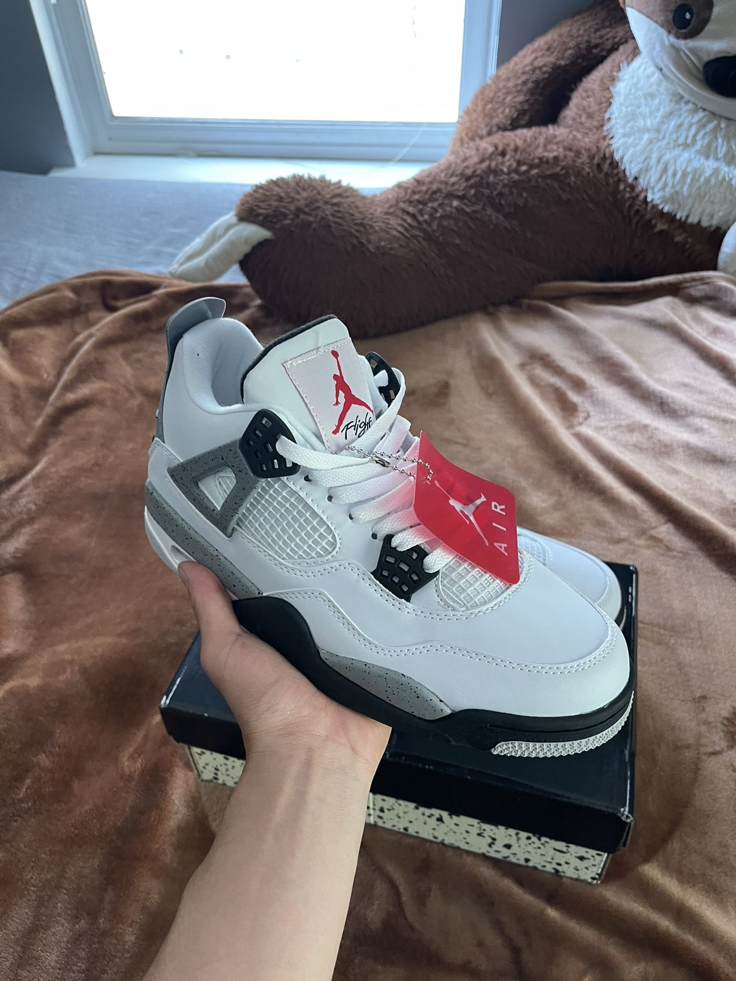 Jordan 4 White Cement