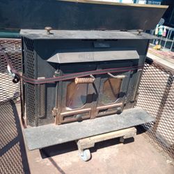 Antique Buck Stove With Blower