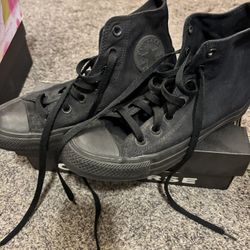 All black Chuck Taylor’s