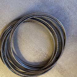 Multi bangle intertwined bracelet