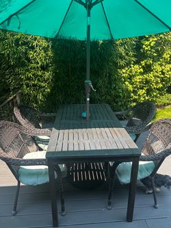 Outdoor dining table, chairs & umbrella
