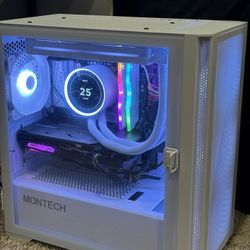 Custom built PC with gaming monitor and keyboard