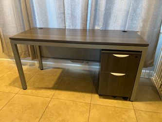 Beautiful Grey desk with drawers on wheels.
