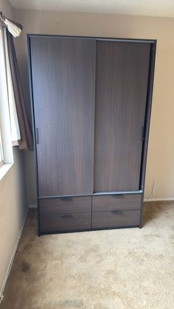 IKEA IKEA TRYSIL wardrobe with two sliding doors and four drawers,