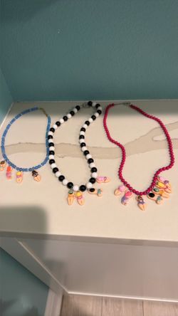 Homemade necklaces and scarves