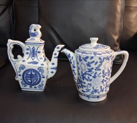 2 Chinese Teapots $25 Dlls.