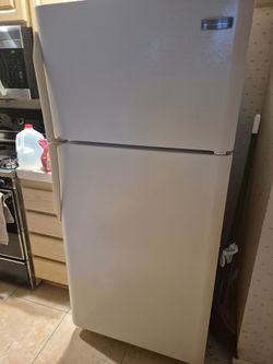 Moving so I must sell my refrigerator it's a Frigidaire full size white freezer on top works fine guaranteed