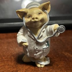 1992 Kathy Wise collection, depicting a pig dressed doctor. 