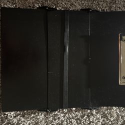 Clipboard, bp arm cuff, thermometer, pen lights, and scissors