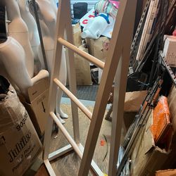 Free standing wooden ladder rack.