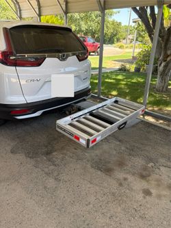 Car hitch storage rack