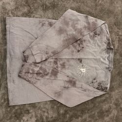 Gray tie-dye long sleeve shirt with white spiderweb graphic