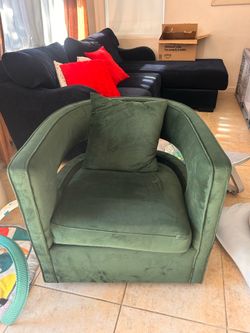 Two green swivel chair