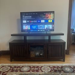 Samsung 40” UHD TV w/ Solid Wood Stand