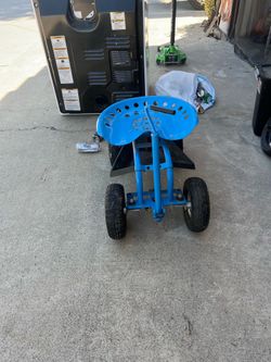 blue Sunnydaze rolling garden cart