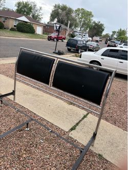Chrome and black leather king size headboard and foot board.