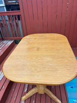 Oak table 60” x 42” includes 2 extending leafs