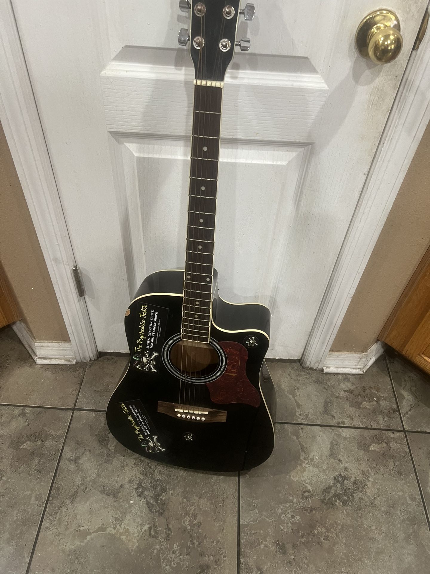 Spectrum AIL-128 Cutaway Acoustic Guitar. Used in good with some cosmetic blemishes and imperfections. There is some rust in the knobs up top. Also th