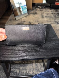 kate spade black wallet with gold logo plaque