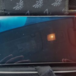 Nintendo switch OLED bundle comes with Mario kart 8 Zelda breath of the wild and Sonic colors