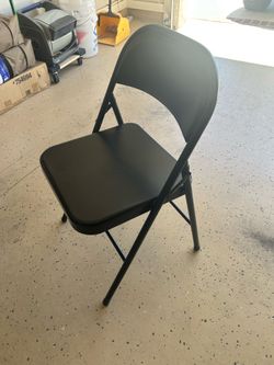 Metal folding chairs.