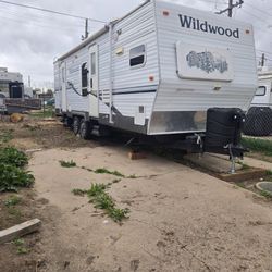 Travel Trailer Inside Lot To Live In  