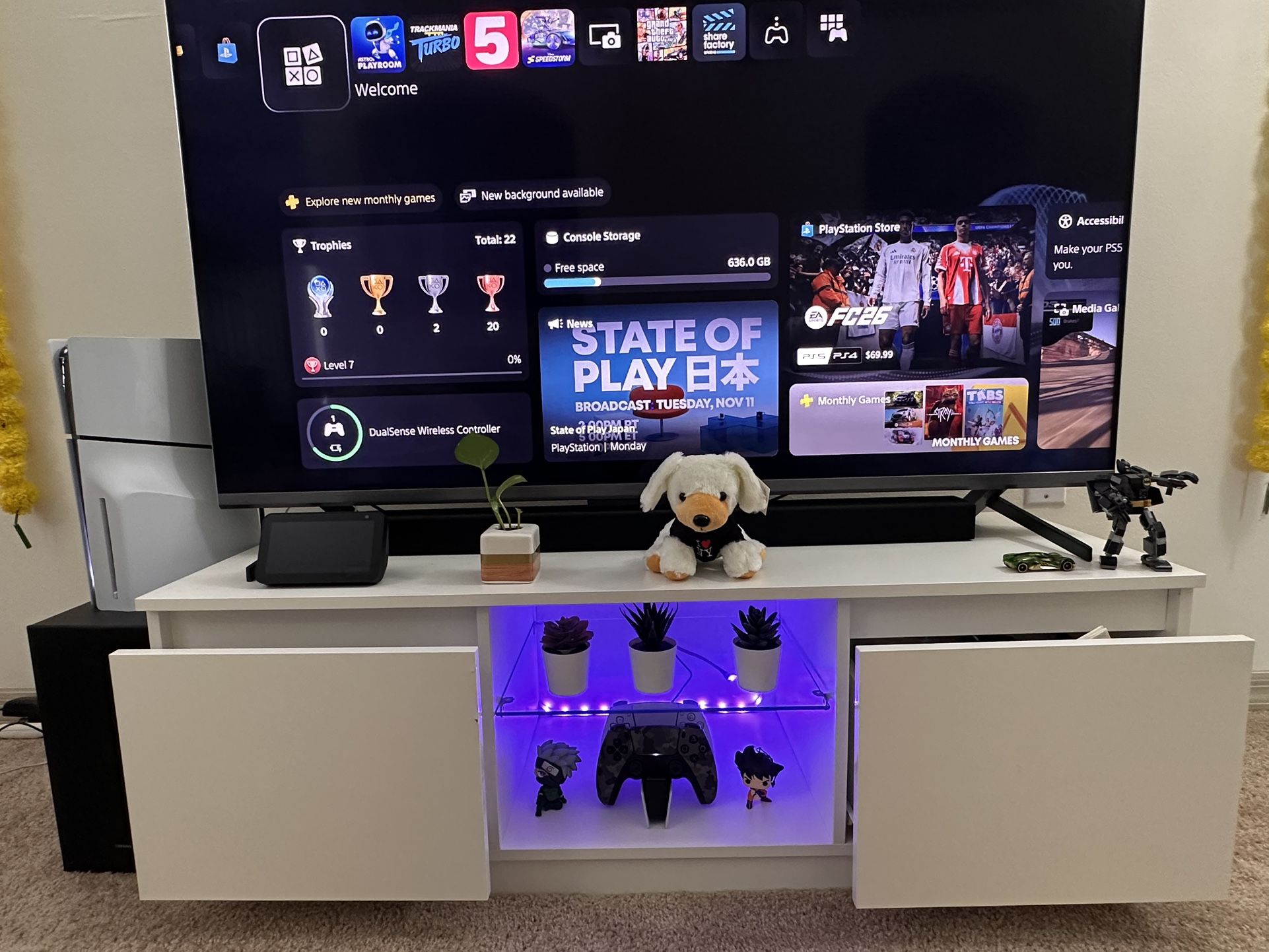 55” inch TCL Tv and White Tv table with LED Lights for sale