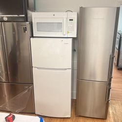 Frigidaire Refrigerator 28” And Microwave  Open Box Never Used