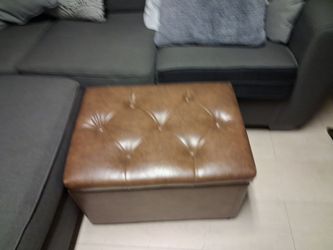 Brown leather ottoman