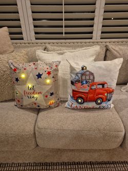 Farmhouse Fourth of July light up pillows.
