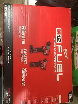 Milwaukee M-12 Fuel Impact and Hammer drill combo with 2 batteries like new