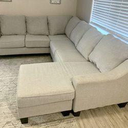 Light Gray Mor Furniture 3pc 115” by 90” Sectional Sofa with Reversible Chaise